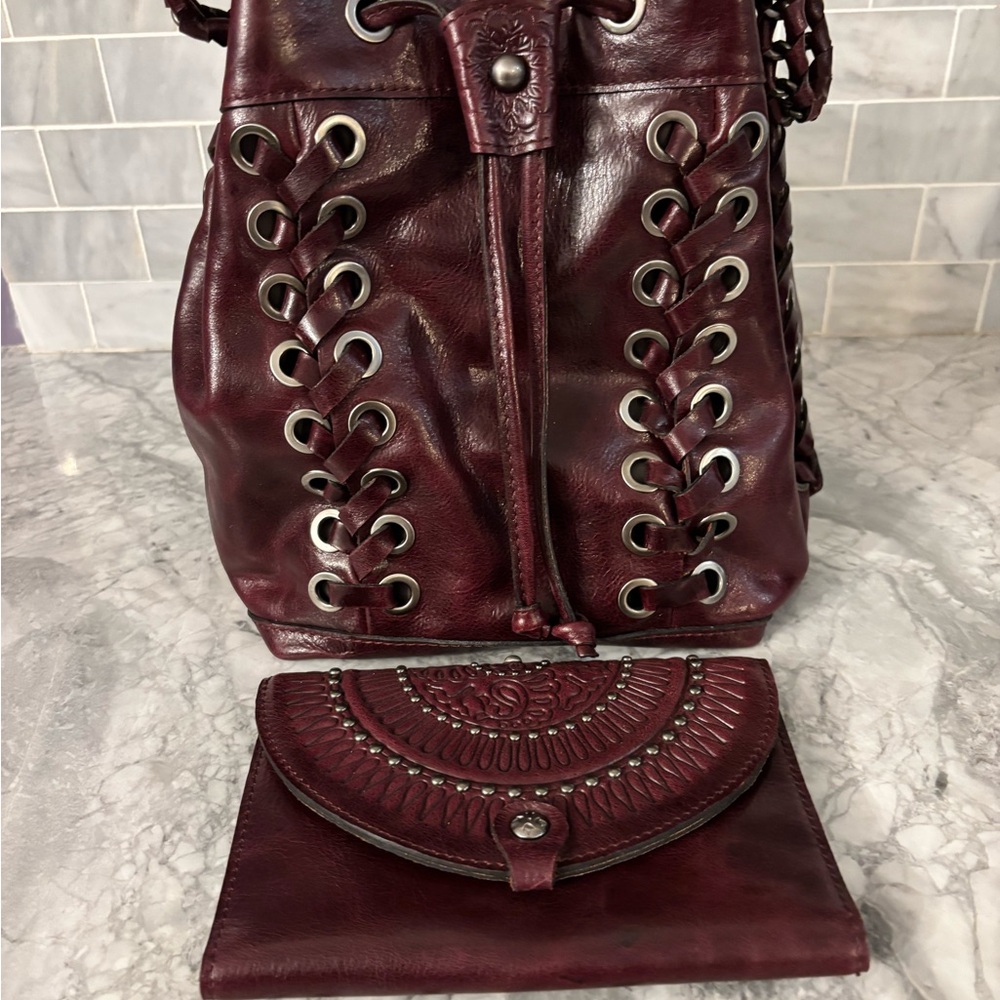 Elegant Burgundy Leather Backpack it’s just the bag I kept the wallet